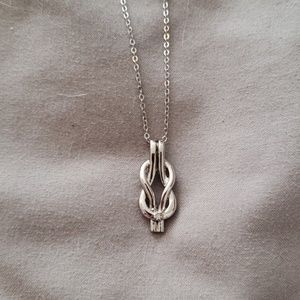 Diamond knot pendant